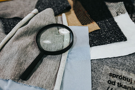 Magnifying glass with fabric on a table thumbnail