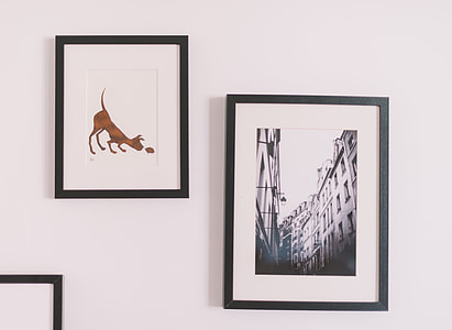 photo of two paintings wall decors thumbnail