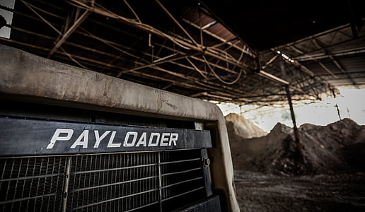 grey Payloader tractor under the roof thumbnail