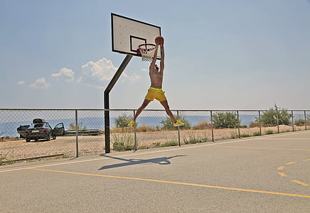 man dunking during daytime thumbnail