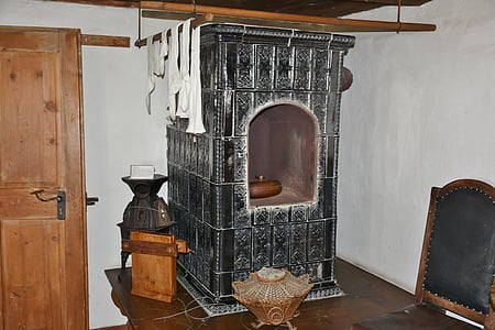black burner on table inside white room thumbnail