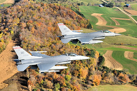 two flying silver aircraft thumbnail
