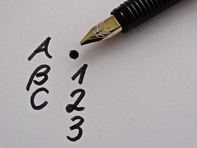fountain pen on paper with ABC and 123 writings thumbnail