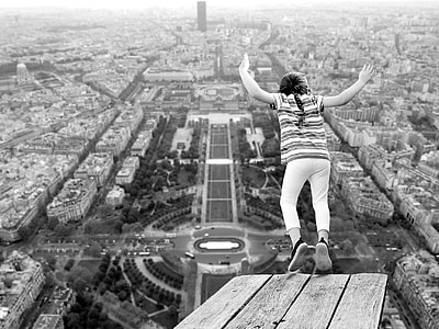 gray scale photography of jumping on wood thumbnail