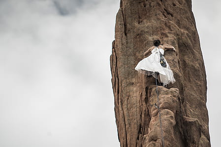 person climbing on mountain thumbnail