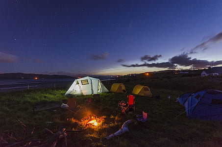 photo of four dome tents on camp site thumbnail