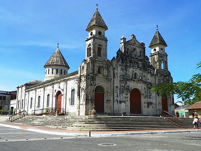 gray concrete cathedral under blue sky thumbnail