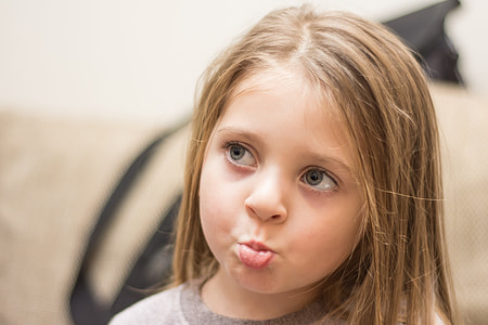 selective focus photo of girl with blonde hair thumbnail