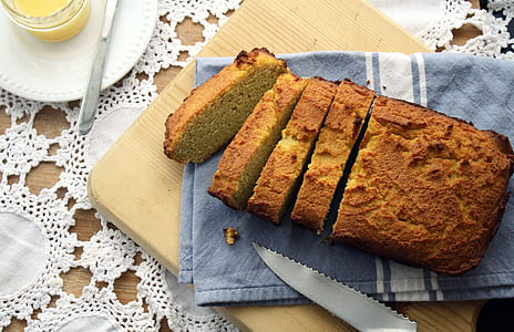 photography of sliced meatloaf on blue textile and chopping board thumbnail