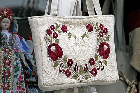 closeup photo of white and red floral tote bag thumbnail