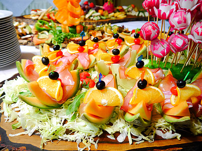 melon with orange slices on platter thumbnail