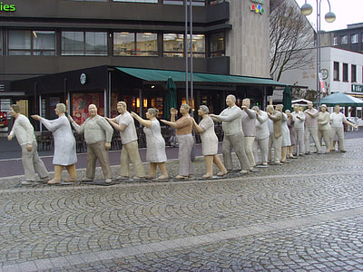 group of people statue during daytime thumbnail