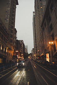 Gray Concrete Buildings Beside Road thumbnail