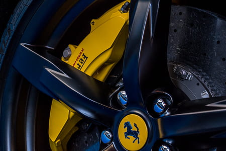 Ferrari wheel with yellow brake caliper thumbnail