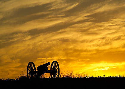 silhouette of canon during sunset thumbnail