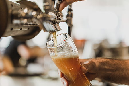 Pouring Pint Of Beer Photo thumbnail