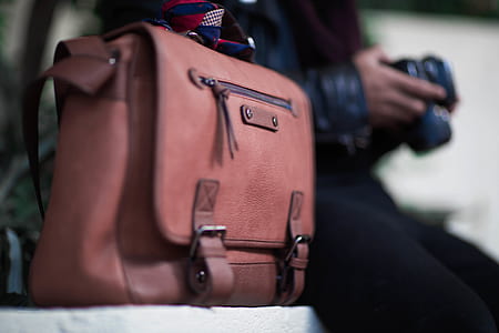 closeup photography of red leather crossbody bag thumbnail