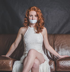 woman in white halter-top dress thumbnail
