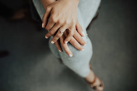 woman in gray pants sits thumbnail