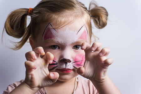 girl with face paint showing cat claws thumbnail