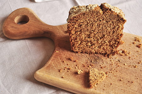 square brownies on brown wooden chopping board thumbnail