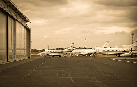 landscape photography of three white airplanes thumbnail
