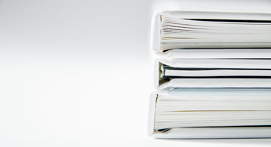 three closed hardbound books thumbnail