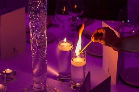 person lighting the candle thumbnail