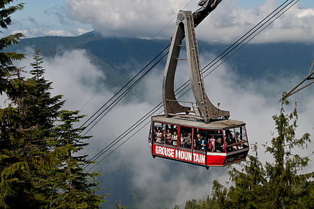 Group of People Going Up to Mountain thumbnail