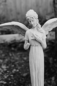 angel holding her breast sculpture thumbnail