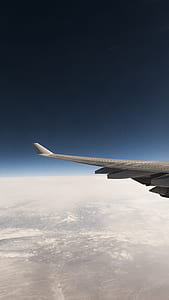 airplane wing in the sky thumbnail