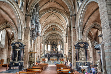 people praying in cathedral thumbnail