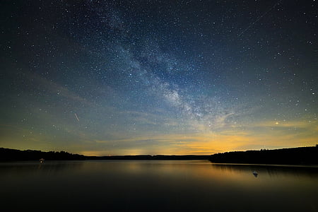 silhouette of mountain under starry starry night thumbnail
