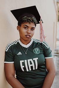 Woman Wearing Green And White Adidas Jersey Shirt thumbnail