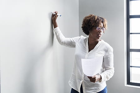 Standing Woman Writing on Wall thumbnail