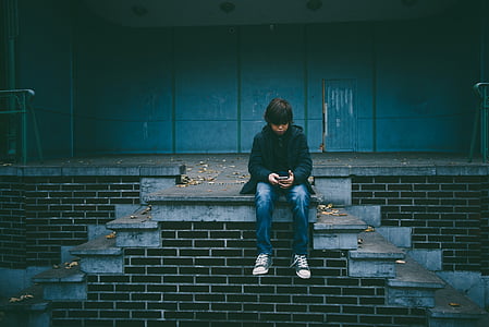 boy wears black zip-up jacket thumbnail