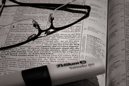 eyeglasses on book thumbnail