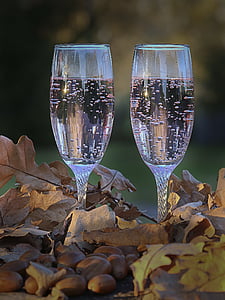two clear glass flutes thumbnail