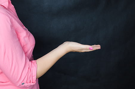 woman in pink on black background thumbnail