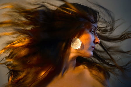 photo of woman wearing white earring thumbnail