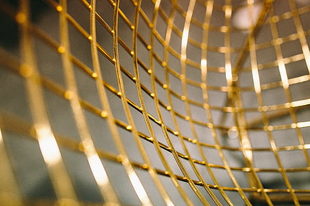 selective focus photography of brass-colored basket thumbnail
