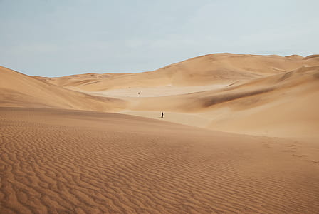 person walking on desert thumbnail