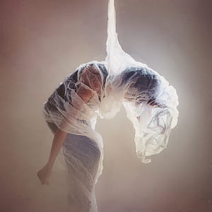 woman wrapped with white sheer net thumbnail