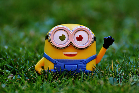 Minion Bob figurine on grass field thumbnail