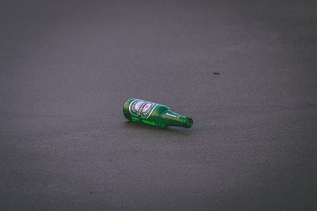 Empty Heineken Bottle on Ground thumbnail