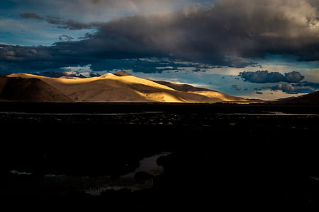 desert mountain under the cloudy sky thumbnail