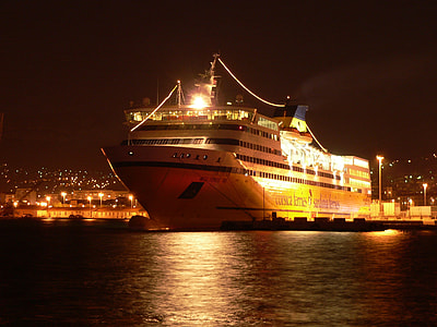 photo of a crew ship on a body of water thumbnail