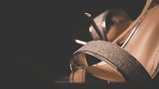 macro photography of leather pumps thumbnail
