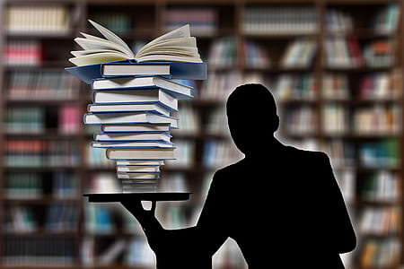 silhouette of person holding books illustration thumbnail
