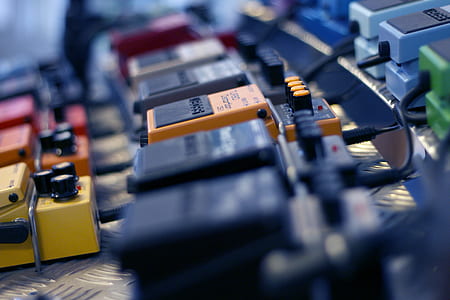 selective focus photo of guitar effect unit lot thumbnail